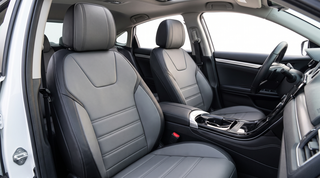 Leather-style BYD seat cushion covers displayed in a modern compact SUV cabin