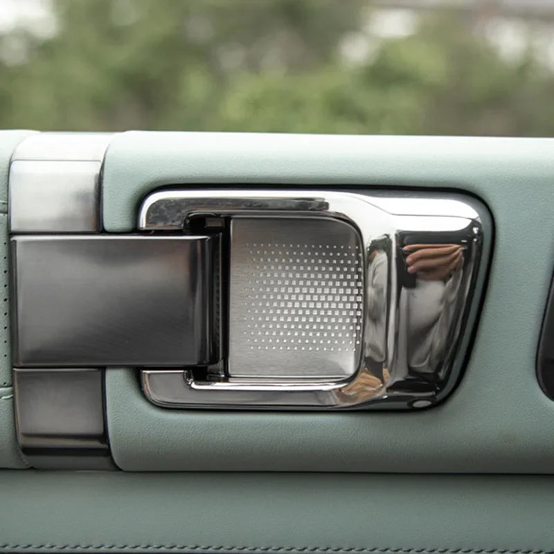 Decoración de la puerta interior del BYD FangChengBao Leopard 5 con cubierta de bocina de acero inoxidable 